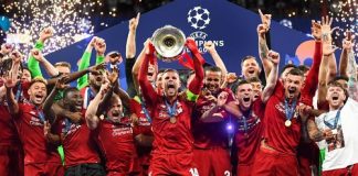 Liverpool celebrating their Champions League trophy